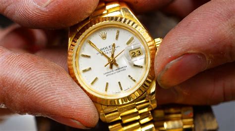 repair ding on rolex watch.